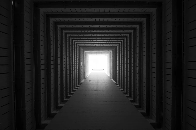 a black and white photo of a light at the end of a tunnel, a black and white photo, by Kristian Zahrtmann, unsplash contest winner, light and space, square lines, cube portals, heaven gate, shot on iphone 6
