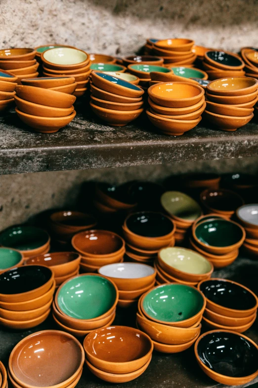 a bunch of bowls sitting on top of a shelf, vietnam, caramel, carefully crafted, thumbnail