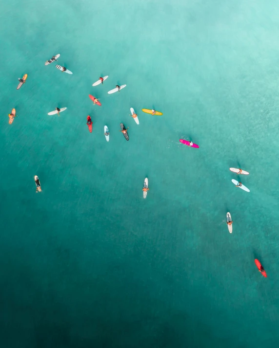 a group of people riding surfboards on top of a body of water, by Adam Marczyński, pexels contest winner, minimalism, colorful crowd, small canoes, thumbnail, multiple stories