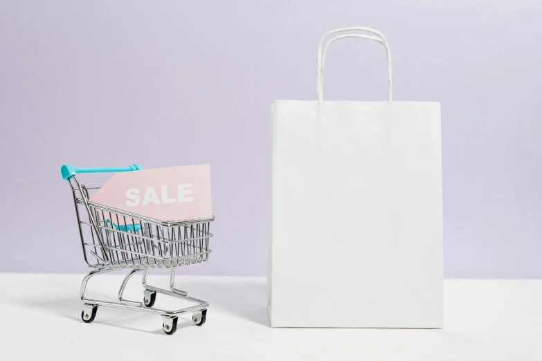 a shopping cart with a sale sign next to it, by Julia Pishtar, trending on unsplash, white color scheme, pastel colours, blank, no - text no - logo