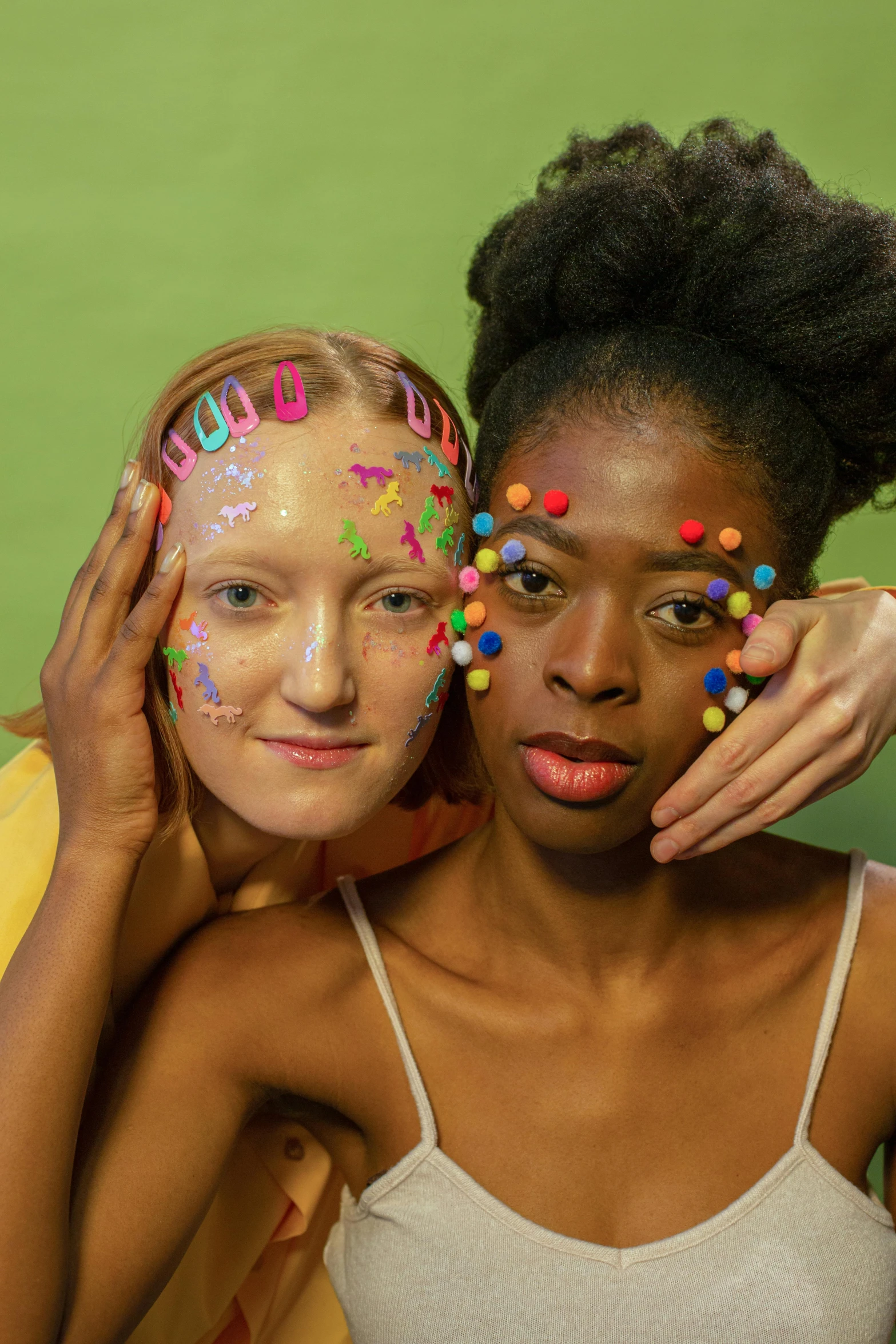 two girls with face paint posing for a picture, an album cover, trending on pexels, renaissance, colored dots, adut akech, lush, college