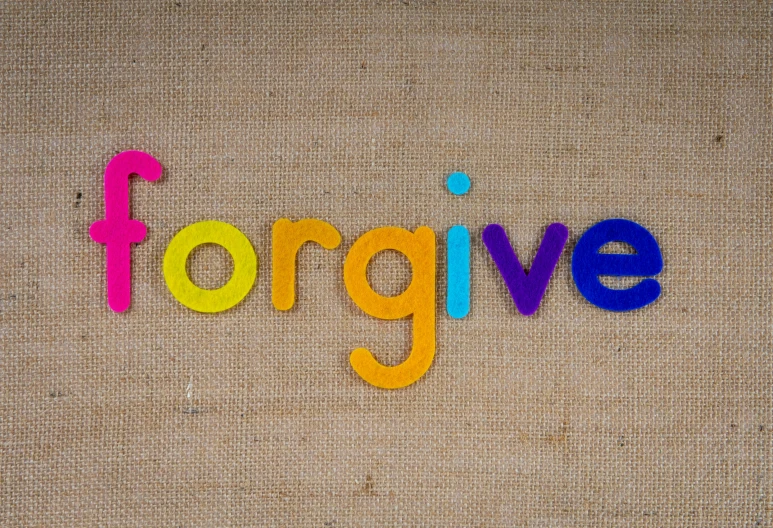 the word forgive spelled in multicolored wooden letters, inspired by John Maxwell, pixabay, florence nightingale, fan favorite, golden rule, wall art