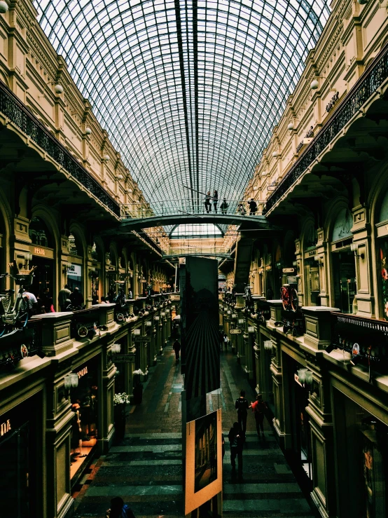 the inside of a building with a glass roof, an album cover, pexels contest winner, visual art, street of moscow, mall goth, lots of shops, buenos aires