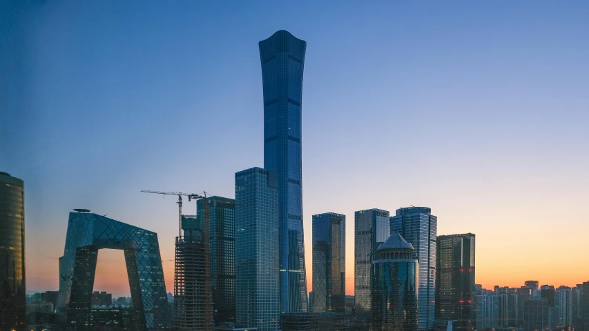 a very tall building in the middle of a city, by Zha Shibiao, pexels contest winner, gutai group, beijing, evening light, skyline showing, xi jinping