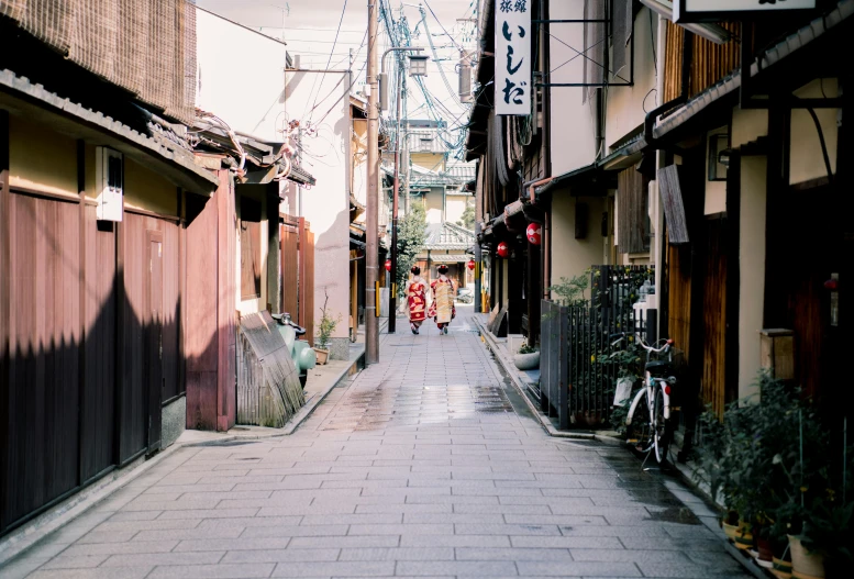 a narrow street with people walking down it, inspired by Miyagawa Isshō, pexels contest winner, pale and coloured kimono, 🦩🪐🐞👩🏻🦳, empty streets, natural morning light