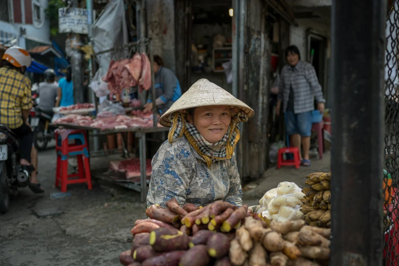 a woman sitting in front of a pile of vegetables, by Dan Content, pexels contest winner, bao phan, square, kete butcher, portrait image