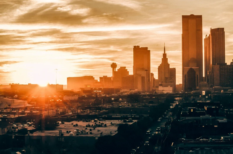 the sun is setting over the city skyline, pexels contest winner, oklahoma, background image, 70s photo, instagram photo