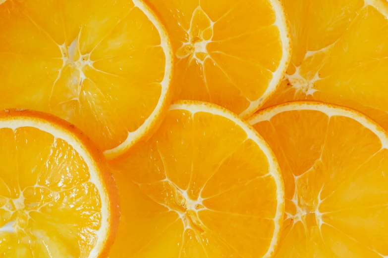 a bunch of orange slices sitting on top of each other, zoomed in, thumbnail, yellow aureole, organic