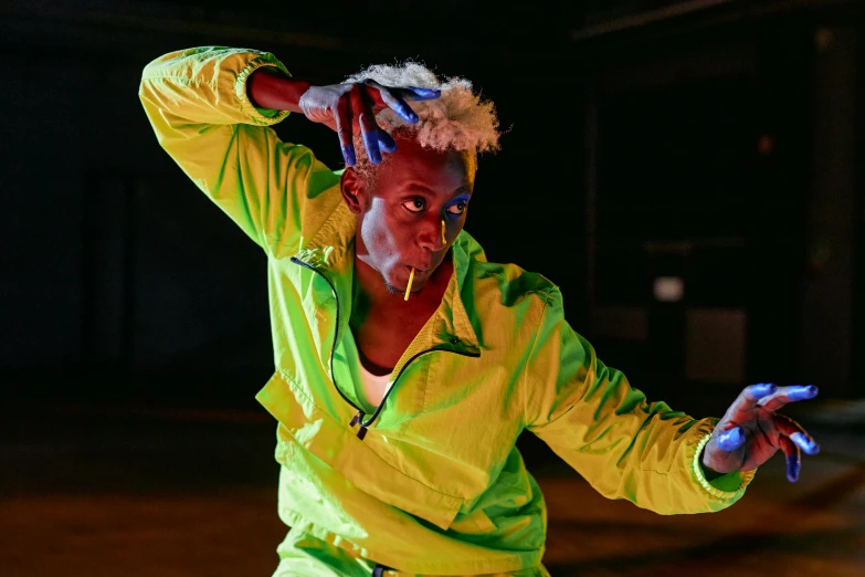 a close up of a person on a skateboard, a portrait, afrofuturism, wearing hi vis clothing, classic dancer striking a pose, wearing a tracksuit, neon hair