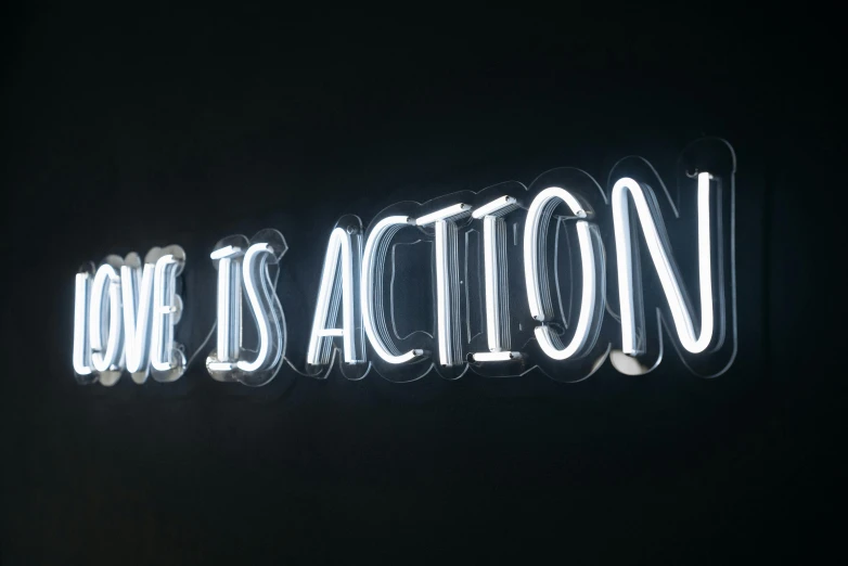 a neon sign that says love is action, pexels contest winner, award - winning brand agency, 15081959 21121991 01012000 4k, yes, action sports