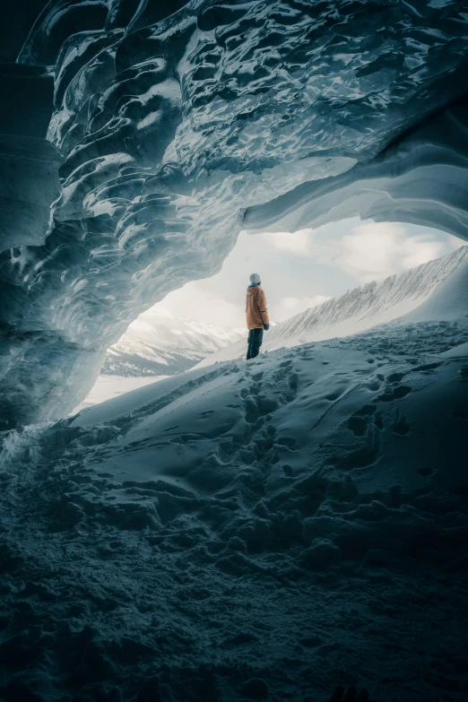 a person standing inside of an ice cave, inspired by Michal Karcz, pexels contest winner, snow dunes, looking off into the distance, glacier coloring, centered in portrait