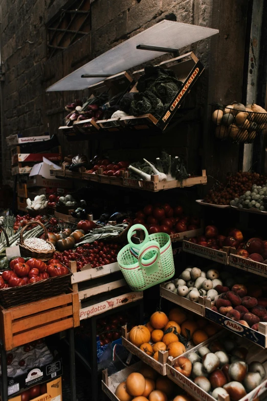 a man standing in front of a fruit stand, inspired by Elsa Bleda, pexels contest winner, renaissance, handbag, panoramic shot, florence, gif