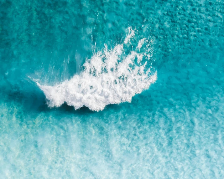 a person riding a surfboard on a wave in the ocean, pexels contest winner, fine art, white cyan, taken from a plane, australian beach, thumbnail