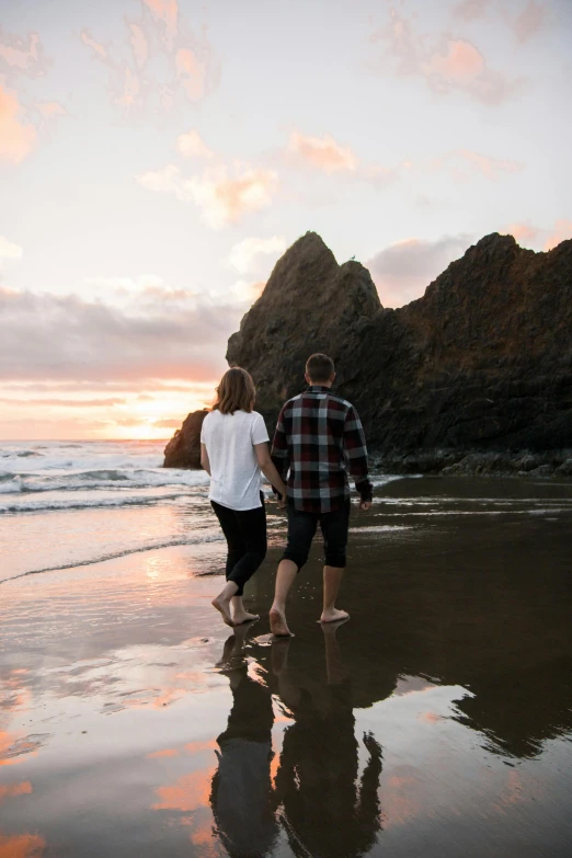 a couple walking along the beach at sunset, by Jessie Algie, on the ocean water, te pae, denim, single