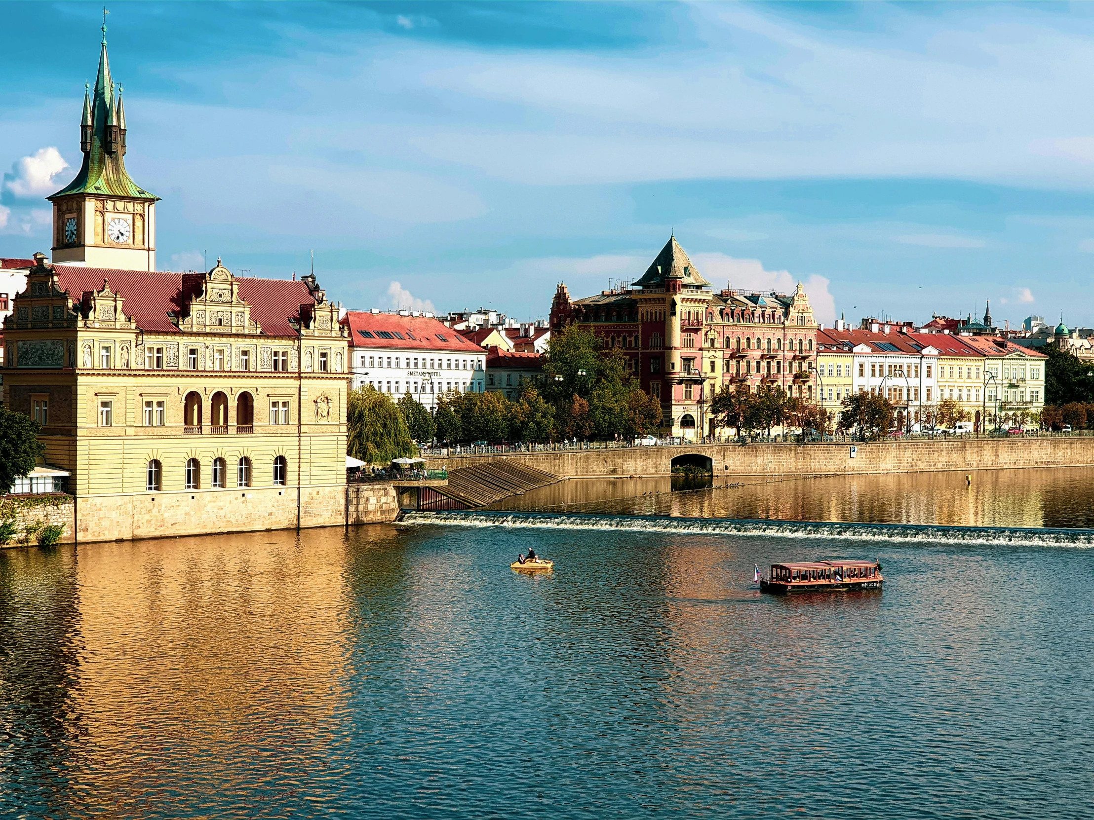 a large body of water with a boat in it, by karolis strautniekas, pexels contest winner, art nouveau, prague in the background, square, olafur eliasson, vibrant water river