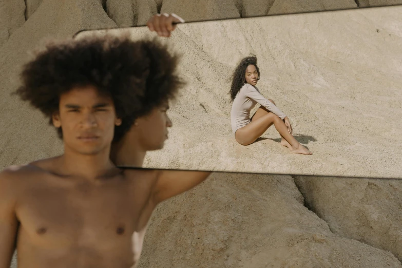 a man taking a picture of a woman in a mirror, an album cover, unsplash, video art, brown skin like soil, on the sand, posing au naturel, 4 k hd film still