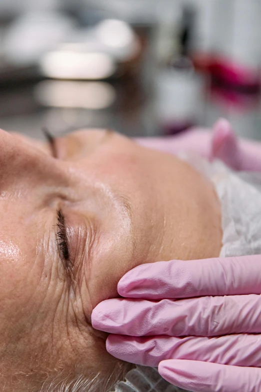 a close up of a person with gloves on, facial, soft opalescent membranes, manuka, high forehead