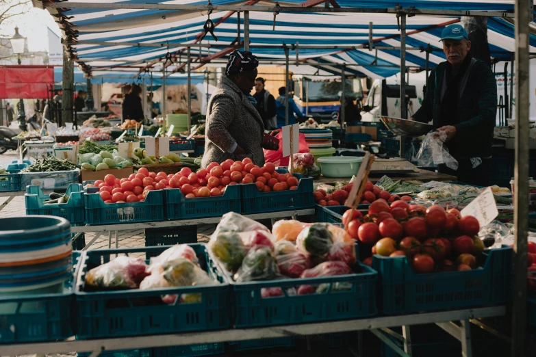 a farmers market filled with lots of fresh produce, a photo, by Daniel Lieske, pexels, renaissance, square, aida muluneh, facing away from the camera, rosen zulu