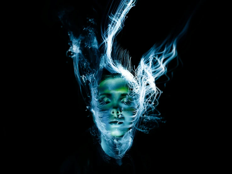a close up of a person's face with smoke coming out of it, digital art, by Adam Marczyński, blue bioluminescence, rankin, female floating, currents