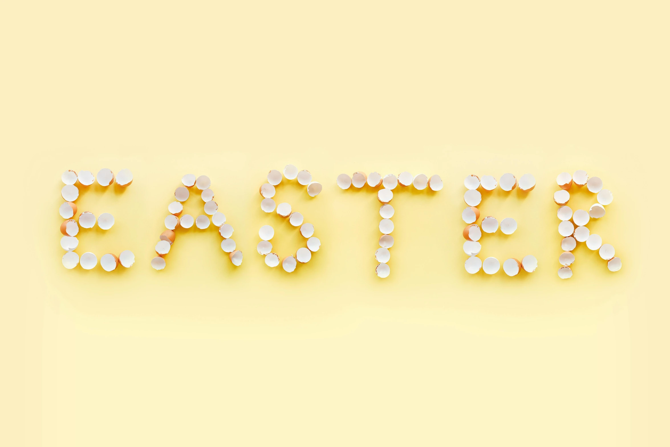 the word easter spelled out of coins on a yellow background, by Ellen Gallagher, pexels, graffiti, shells, leds, dessert, servers