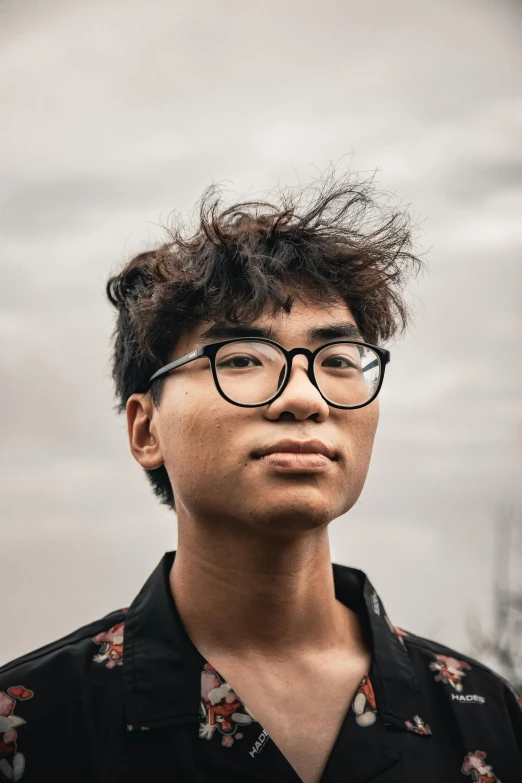 a close up of a person wearing glasses, an album cover, inspired by Feng Zhu, pexels contest winner, portrait of a rugged young man, lgbtq, headshot profile picture, heavily upvoted