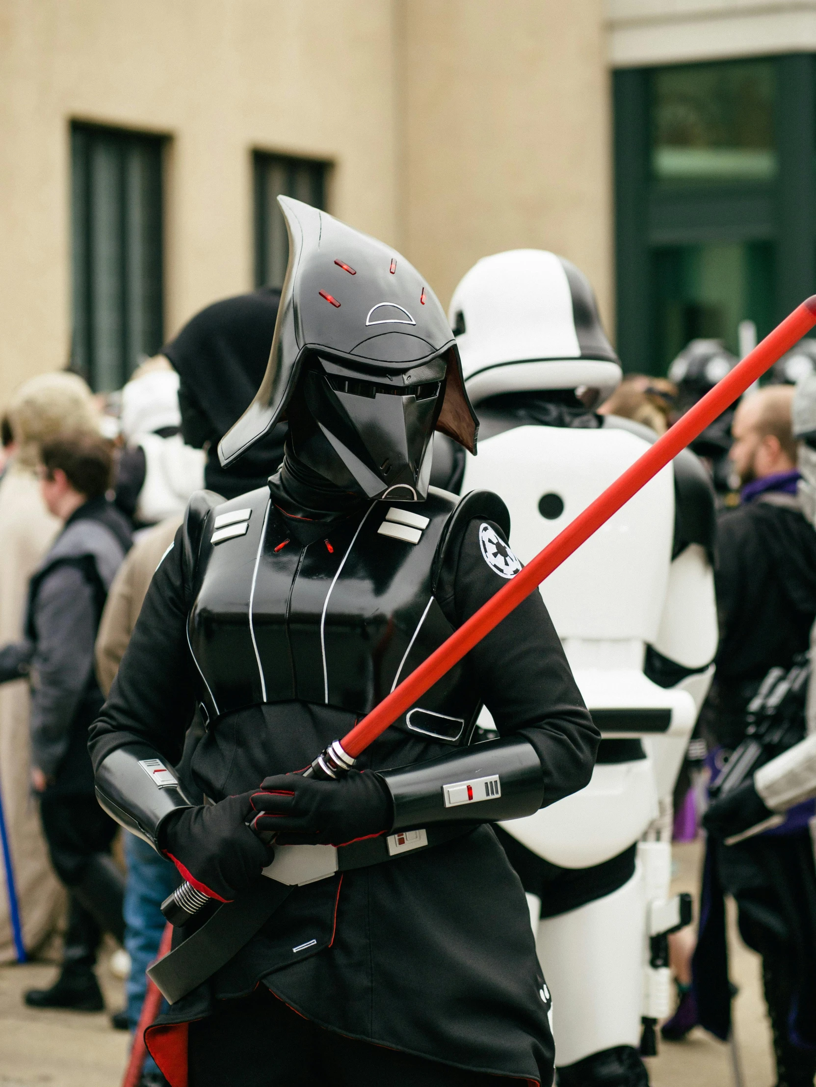 a group of people dressed as star wars characters, reddit, berlin secession, sharp sleek edged black armor, 2019 trending photo, profile image, street photo