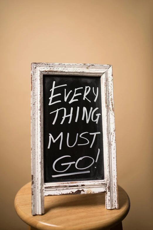 a chalk board with the words everything must go written on it, a picture, white frame, mike stoklasa, thumbnail, - 8