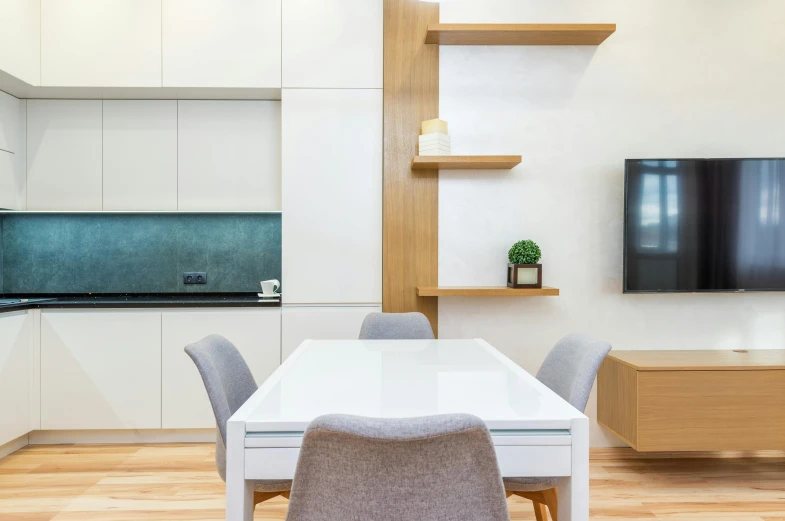 a dining room table with chairs and a flat screen tv, by Adam Marczyński, unsplash, light and space, cabinets, manly design, profile image, white and teal metallic accents