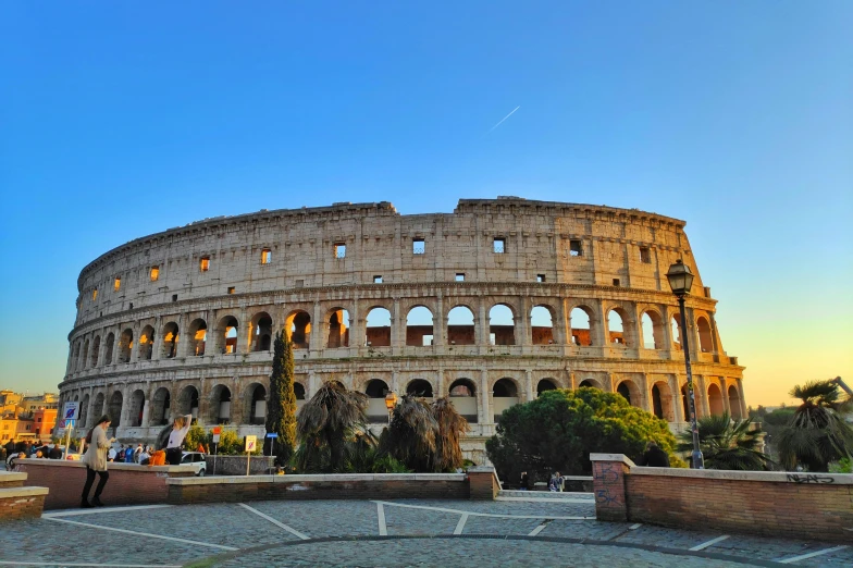 a view of the colossion in rome, italy, pexels contest winner, neoclassicism, colosseo, profile image, golden hour photo, exterior view