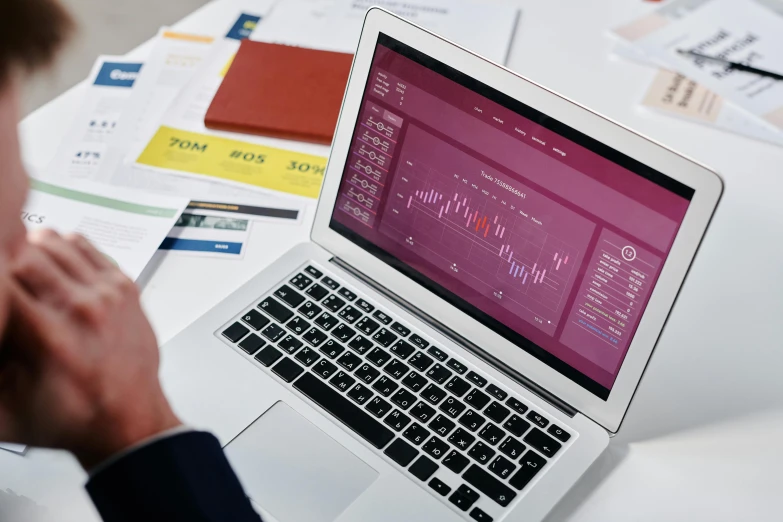 a man sitting in front of a laptop computer, a computer rendering, trending on unsplash, analytical art, waveforms on top of square chart, product introduction photo, coloured, fan favorite