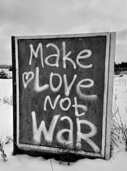 a black and white photo of a sign that says make love not war, by James Warhola, winter, bonnie maclean, art masterpiece, battle