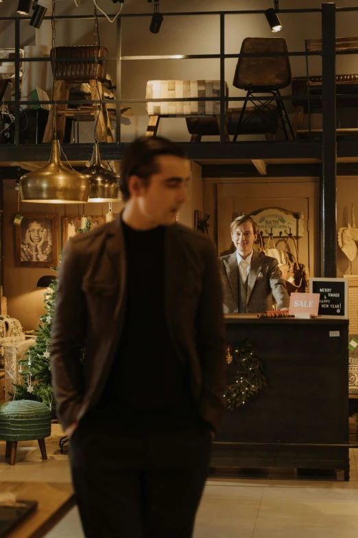 a man that is standing in a room, quirky shops, medium shot of two characters, cosy atmosphere, move still