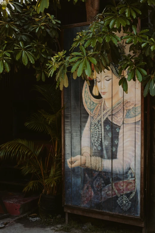a painting of a woman on the side of a building, inspired by Xie Huan, unsplash, in the tropical wood, restaurant exterior photography, ornate wood, paradise garden massage