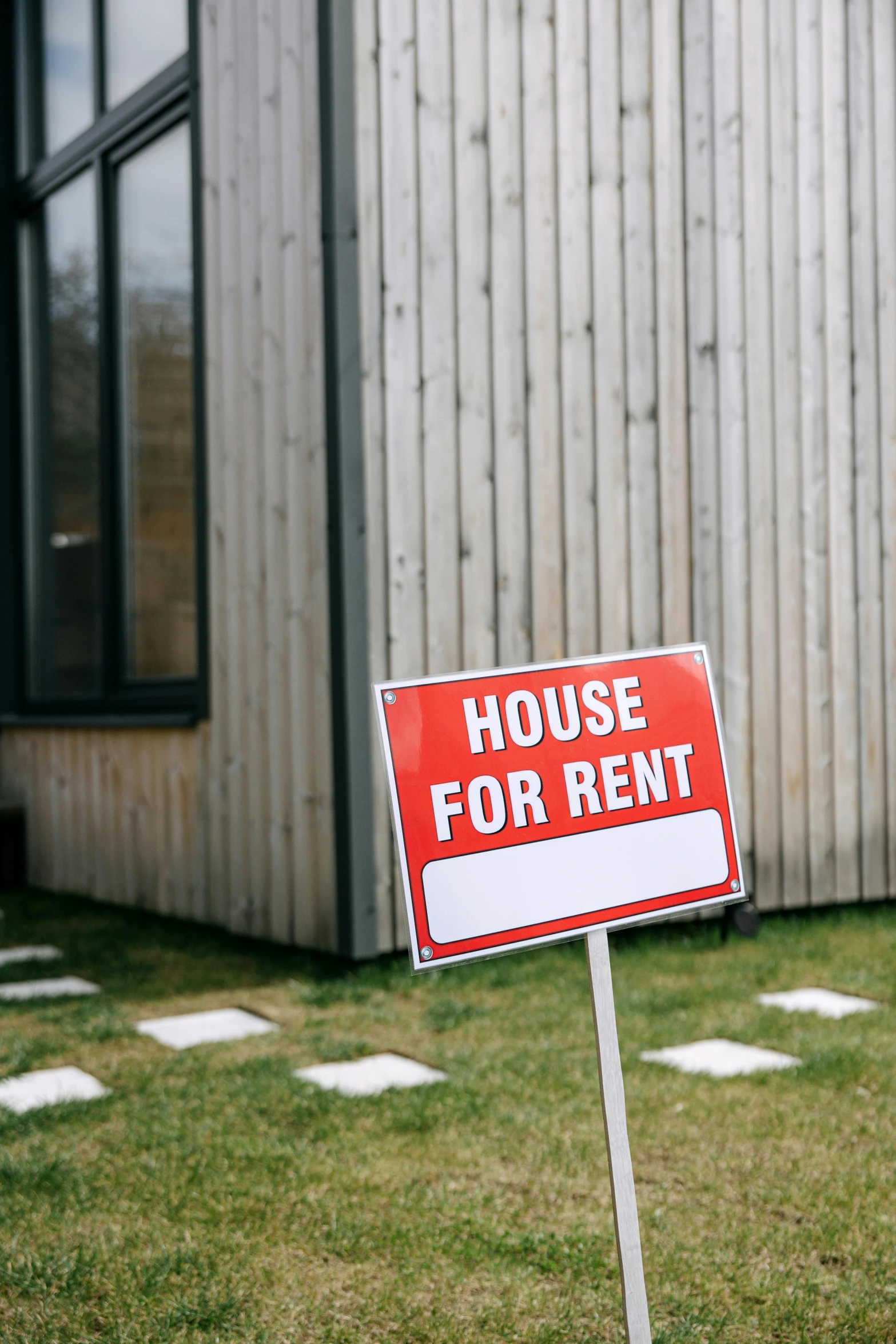 a house for rent sign in front of a house, by Carey Morris, shutterstock, modernism, instagram story, makeshift house, tiny house, square