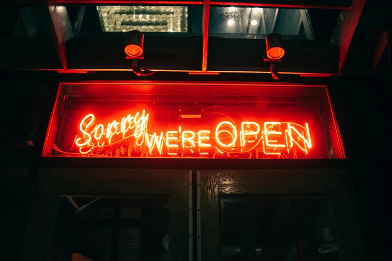 a neon sign that says sorry we were open, unsplash contest winner, happening, 💋 💄 👠 👗, scary stories, local bar, ripley scott