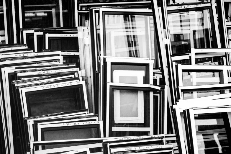 a black and white photo of a bunch of windows, pexels, visual art, square pictureframes, saatchi art, scrapyard, vinyl material