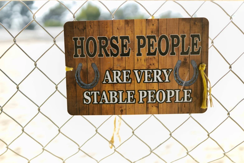 a sign that says horse people are very stable people, pexels, rusty chain fencing, realistic people, handheld, 8 k -