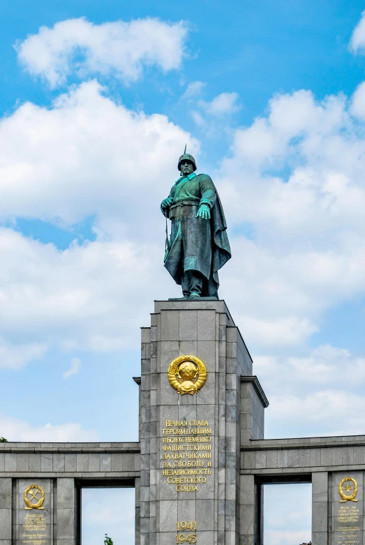 a statue of a man standing in front of a building, inspired by Illarion Pryanishnikov, unsplash, berlin secession, general uniform, avatar image