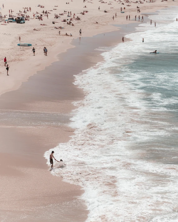 a group of people walking along a beach next to the ocean, pexels contest winner, renaissance, pink water in a large bath, thumbnail, ocean swells, lgbt