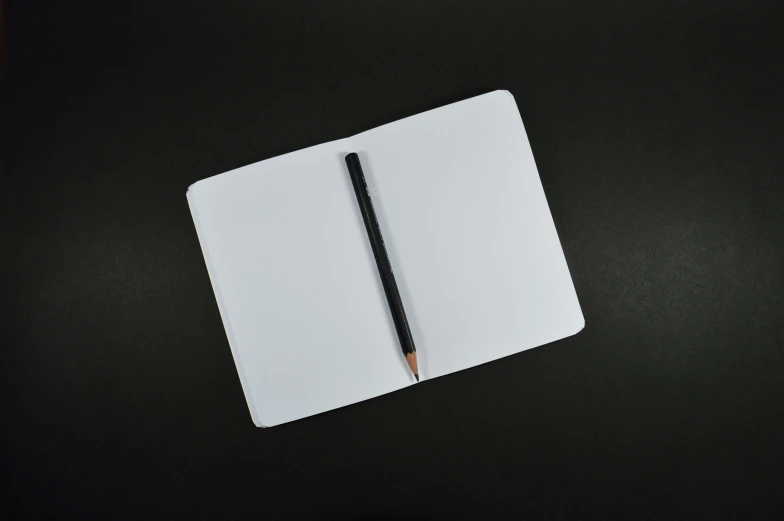 a notepad with a pencil on top of it, by Carey Morris, pexels, plain black background, white, rectangle, black