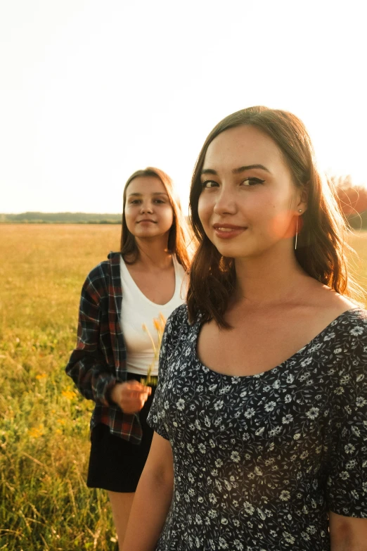 a group of women standing next to each other in a field, by Adam Marczyński, golden hour 4k, young teen, headshot, 15081959 21121991 01012000 4k