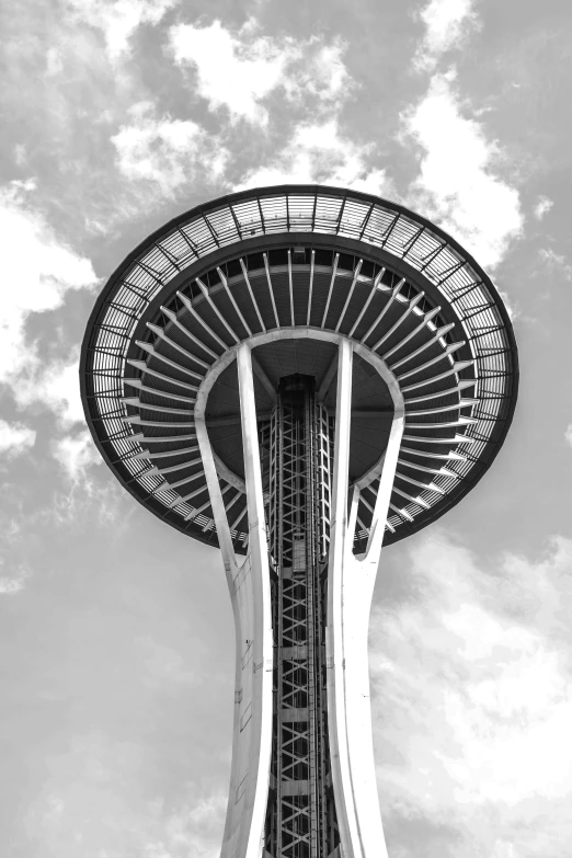 a black and white photo of the space needle, hurufiyya, rounded architecture, a colorful, heaven in the top, cascade