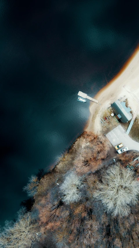 an aerial view of a house on top of a hill, by Sebastian Spreng, pexels contest winner, hurufiyya, near a jetty, thumbnail, brown, blue