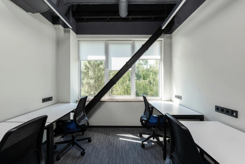 an empty office with desks and chairs, inspired by Francisco Zúñiga, unsplash, light and space, located in hajibektash complex, thumbnail, studio photo, uhq