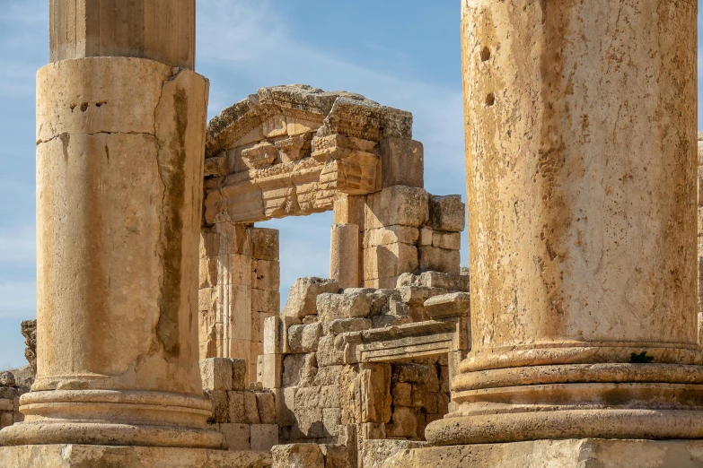 a couple of columns sitting next to each other, pexels contest winner, neoclassicism, huge old ruins, hebrew, massive arch, shallan davar