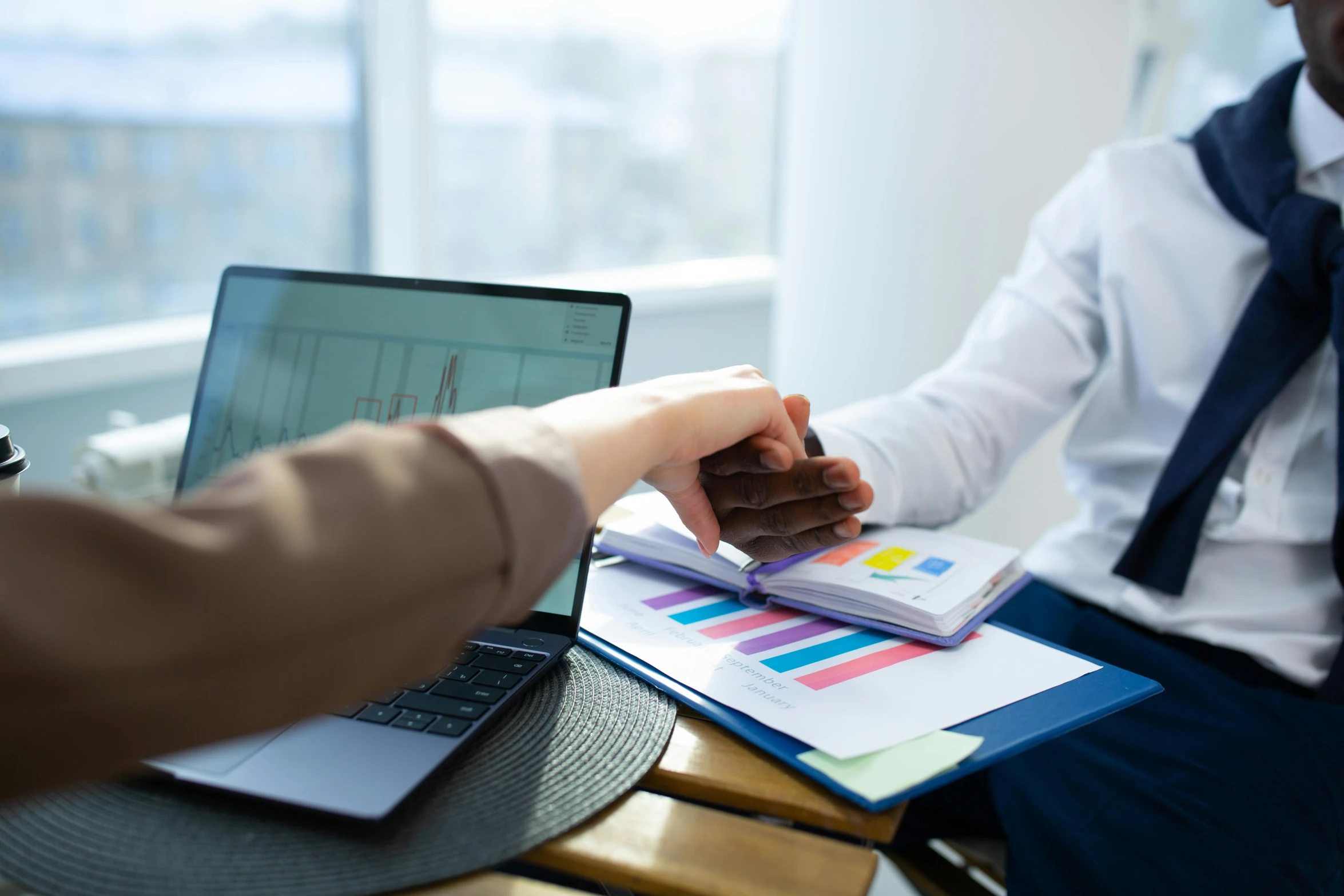 two people shaking hands in front of a laptop, by Carey Morris, pexels contest winner, hurufiyya, charts, coloured, sat in an office, avatar image