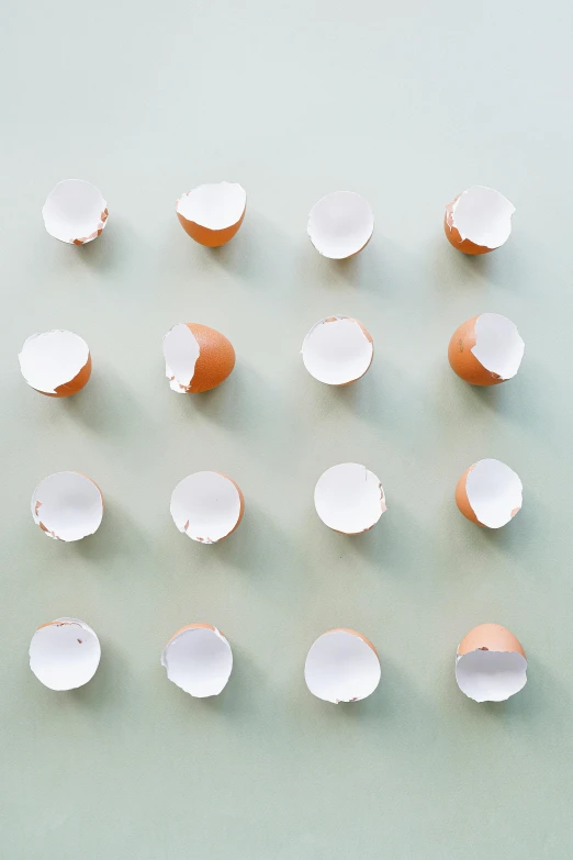 a group of eggs sitting on top of a table, an album cover, by Jan Tengnagel, trending on unsplash, interactive art, shattered wall, porcelain organic, ffffound, 15081959 21121991 01012000 4k
