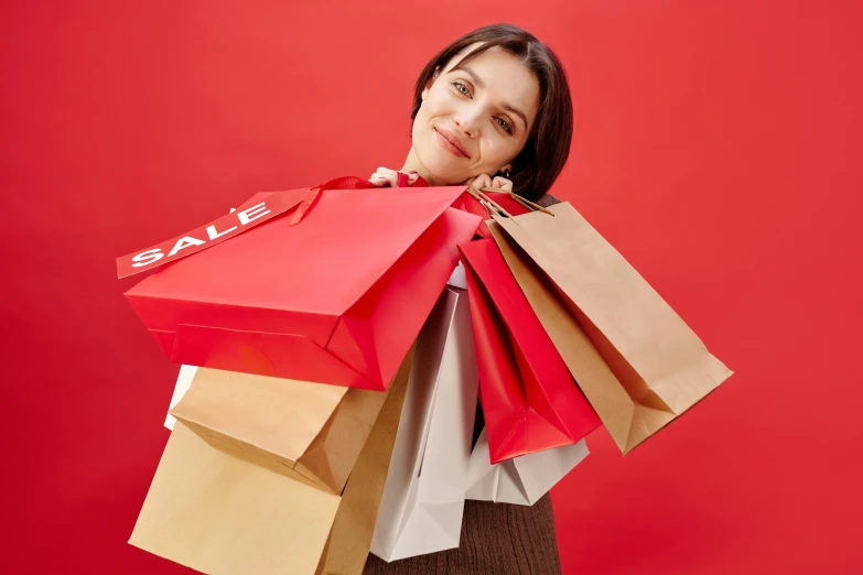 a woman holding shopping bags on a red background, pexels contest winner, aaaaaaaaaaaaaaaaaaaaaa, meredit frampton style, brown, home shopping network