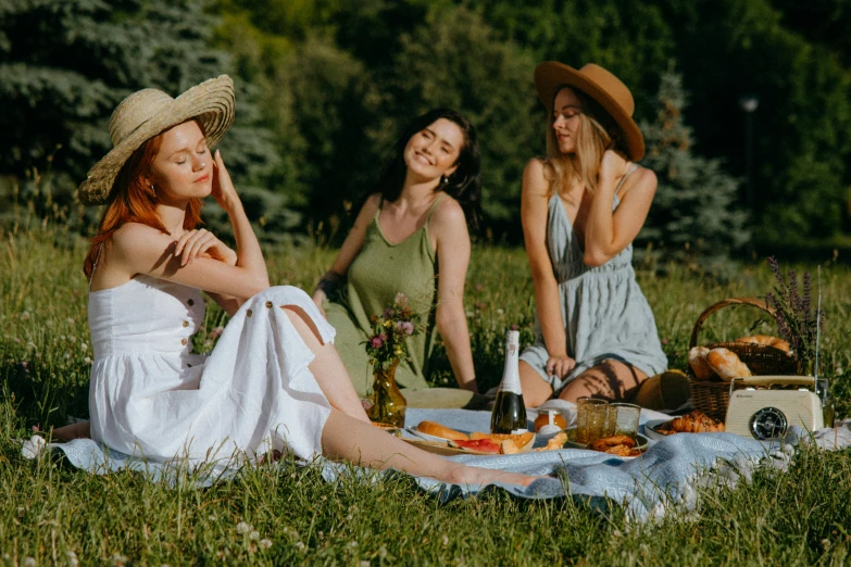 a group of women sitting on top of a lush green field, by Adam Marczyński, pexels contest winner, renaissance, having a picnic, attractive female, gourmet and crafts, white