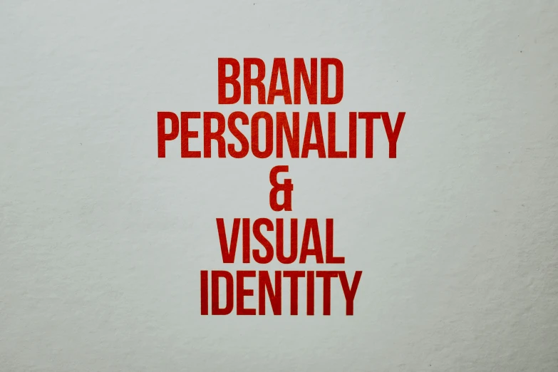 a sign that says brand personality and visual identity, an album cover, avatar image